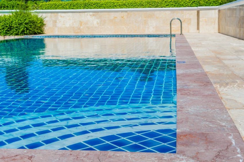 GMP-Pool-Value Blue water in an outdoor swimming pool.